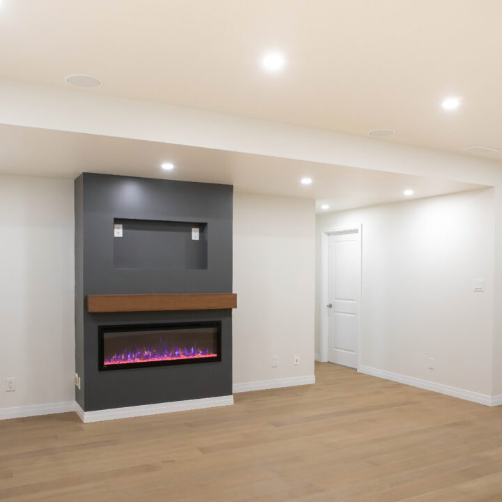 Basement finishing and renovation, custom fireplace and flooring
